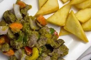 Fried yam with gizzard