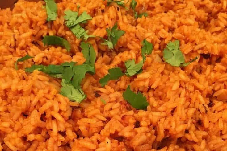 A plate of Rice with beef