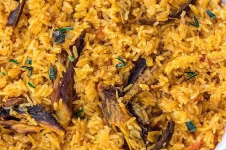 Village Rice with plantain or moimoi