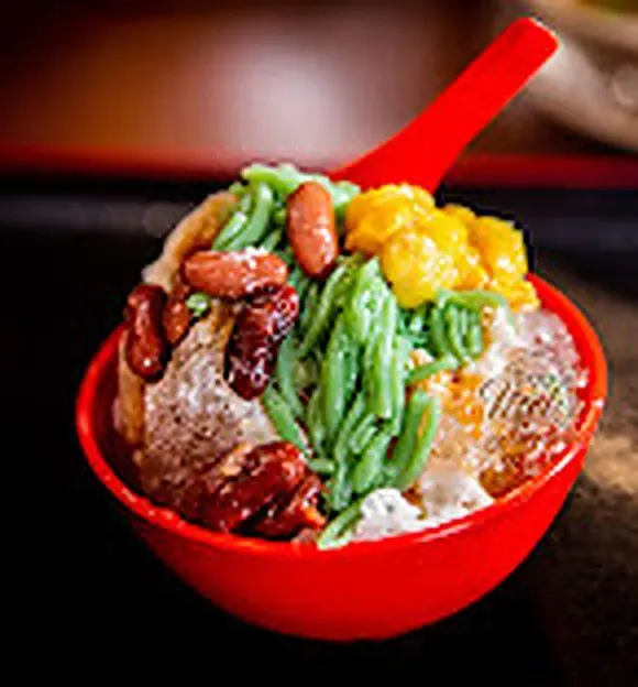 Ais kacang dessert in a red bowl at Cafe Jeliro Sengoti, Ampang