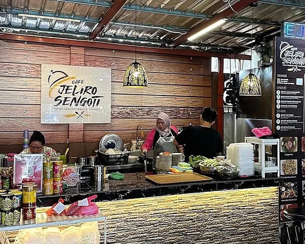 Cafe Jeliro Sengoti signboard with the tagline Sedap Sengoti Make Puah Hati, Ampang, Malaysia