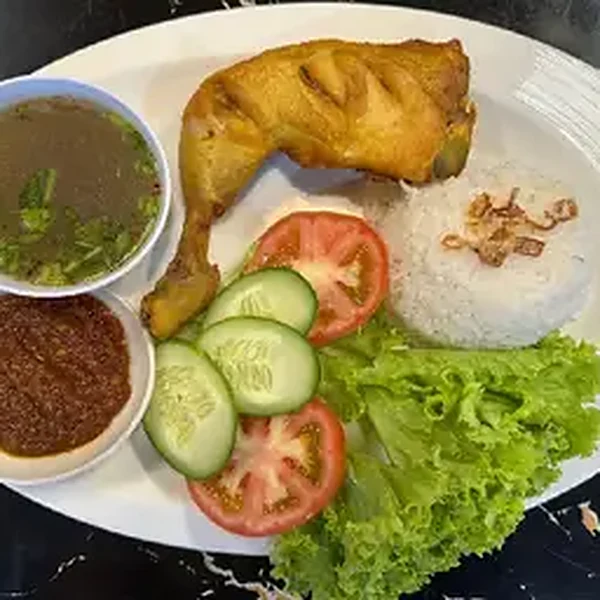 Nasi ayam with sambal, soup and salad at Cafe Jeliro Sengoti, Malaysia, a FoodChow online ordering customer